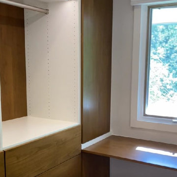 Modern Master Closet with Lighting and Drawers