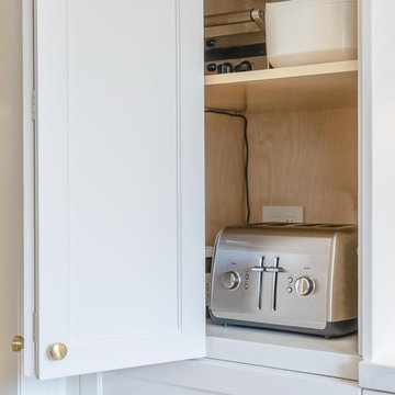 Transitional Kitchen with Flush Discreet Outlets in Island