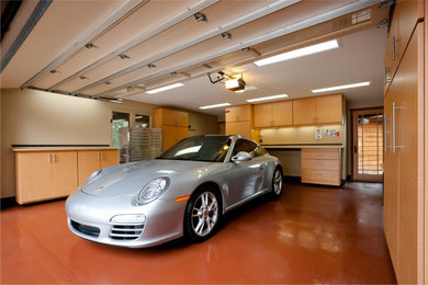Photo of a large traditional attached two-car garage in Sacramento.