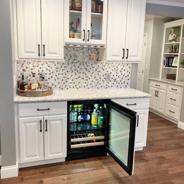 Open Concept Remodel in Rock Island With Walls Removed and a Custom Entry Bench
