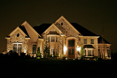 This is an example of a huge traditional front yard landscaping in New York.