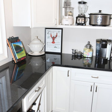 Traditional White Pantry with Dark Stone Counters and Built-in Wine Storage