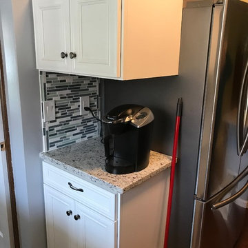 kitchen remodel--white cabinets/granite countertops/floors