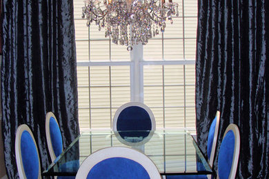 Mid-sized eclectic medium tone wood floor enclosed dining room photo in New York with beige walls and no fireplace
