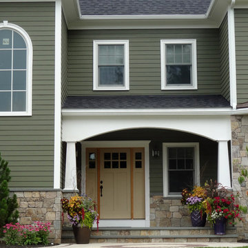 Combining Colonial Tan Natural Stone with Olive Green Siding