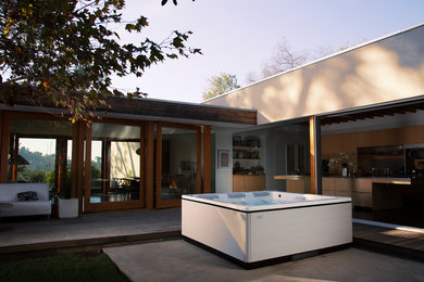 Inspiration for a mid-sized contemporary backyard deck remodel in Orange County