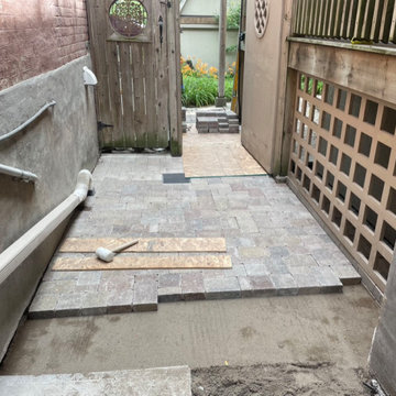New hardscape stone paver pathway with drain installation