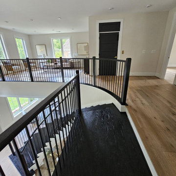 Project #130 | Curved Staircase with Wraparound Balcony