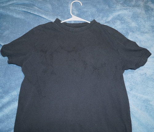 Weird stains on dark clothes after washing