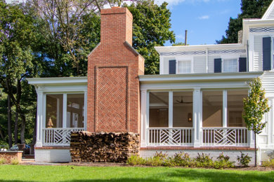 Screened porch with fireplace addition