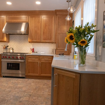 Transitional Warm Wood Farmhouse Kitchen Remodel | Quartz Countertops & Modern L