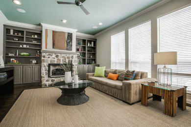 Inspiration for a mid-sized transitional open concept dark wood floor living room remodel in Dallas with beige walls, a standard fireplace and a stone fireplace