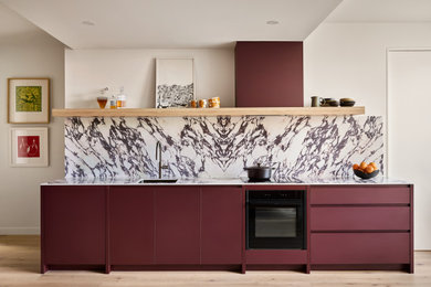 This is an example of a contemporary kitchen in Melbourne.