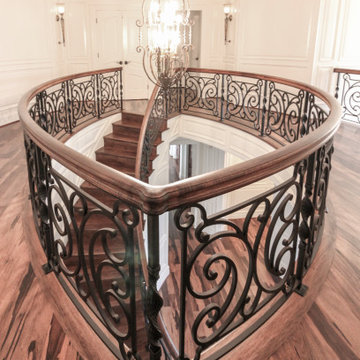 Project #74 | Circular Staircase with Hand-Forged Metal Panels