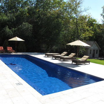 Libertyville, IL. Fiberglass swimming pool with auto cover