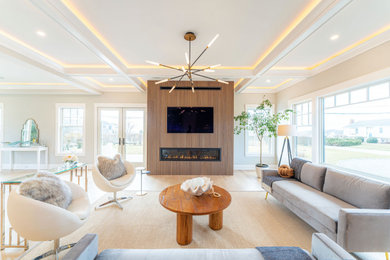 Foto de salón moderno con marco de chimenea de madera