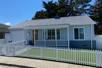 Mid-sized elegant gray one-story stucco house exterior photo in San Francisco