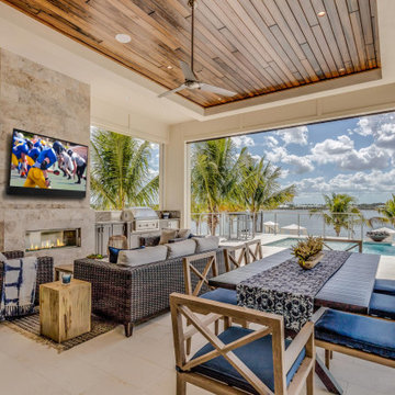 Covered Outdoor Living Space Featuring Seura Outdoor TV