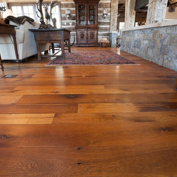Hand Hewn Hammer Beams and Slab Siding with Oak Flooring