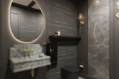 Inspiration for a mid-sized transitional tray ceiling powder room remodel in DC Metro with a one-piece toilet and beige walls