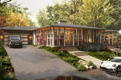 Example of a 1950s multicolored one-story exterior home design with a metal roof and a gray roof