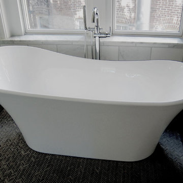 Slipper Bathtub / harringbone tile