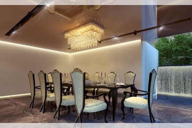 Minimalist dining room photo in Mumbai