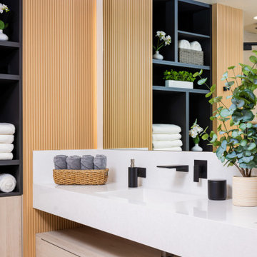 Family bathroom renovation with brighter finishes and easier maintenance surface