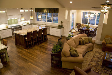 Inspiration for a mid-sized timeless formal and open concept dark wood floor and brown floor living room remodel in Salt Lake City with beige walls, a standard fireplace, a stone fireplace and no tv