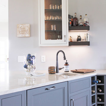 White Kitchen with Blue Bar Area