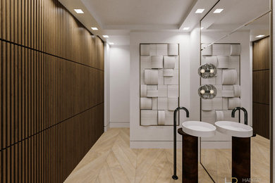 Example of a small trendy white tile and stone tile medium tone wood floor and tray ceiling powder room design in Houston with dark wood cabinets, a two-piece toilet, white walls, a pedestal sink and a freestanding vanity