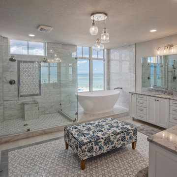 Oceanfront Spa-Inspired Bathroom with Freestanding Tub and Marble Detailing