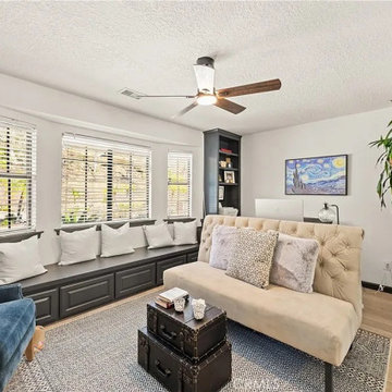 Home Office with Built-In Window Seating and Custom Shelving