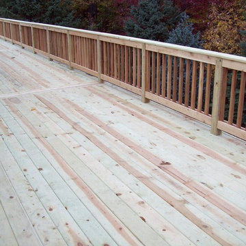LARGE BASIC PRESSURE TREATED DECK WITH CEDAR INFILL AND BALUSTERS