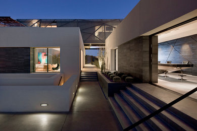Inspiration for an expansive contemporary two-storey white exterior in Los Angeles.