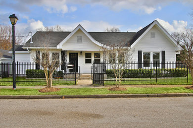 Inspiration for a modern white one-story vinyl exterior home remodel in Houston