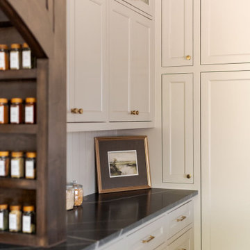 Painted Inset Cabinetry and Leathered Granite in a Transitional Edmond Kitchen