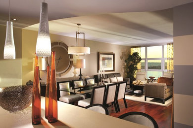 Inspiration for a mid-sized contemporary open concept dark wood floor living room remodel in San Diego with gray walls, no fireplace and a wall-mounted tv