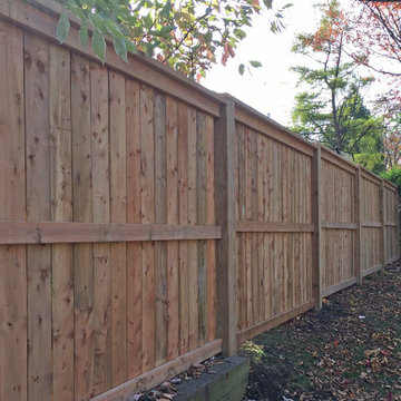 Palisade Style Wood Fence with Horizontal Trims