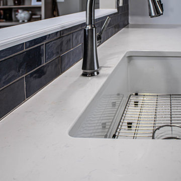 Two Tone Kitchen: Navy and Wood Kitchen with Carrara Wind Quartz Countertops