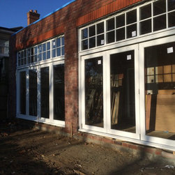 Timber Bi-fold doors with fanlight windows over - Home Improvement