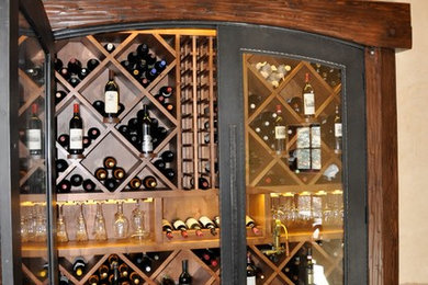 Inspiration for a wine cellar remodel in Denver