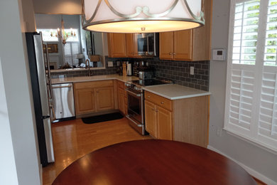 Example of a transitional kitchen design in Richmond