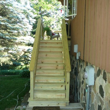 Second Story Deck with Stairs to Backyard