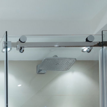 Modern Bathroom with Rolling Shower Doors and Vanity Mirror