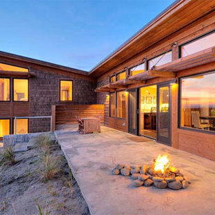 Example of a beach style home design design in San Diego