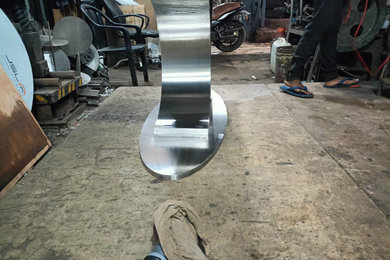 Sculpted Elegance – Premium Black Stainless Steel Dining Table Base