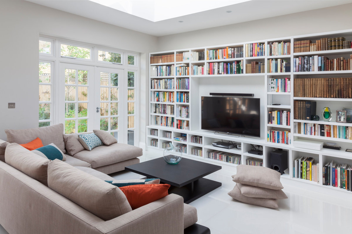 Bespoke bookshelf perfectly frames the television.