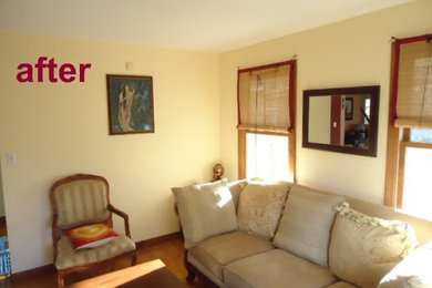 Example of a mid-sized ornate enclosed medium tone wood floor family room design in Boston with no fireplace and a tv stand