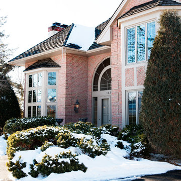 Exterior Specialty Circle Top Combination Windows w/Sunburst & Colonial Grilles